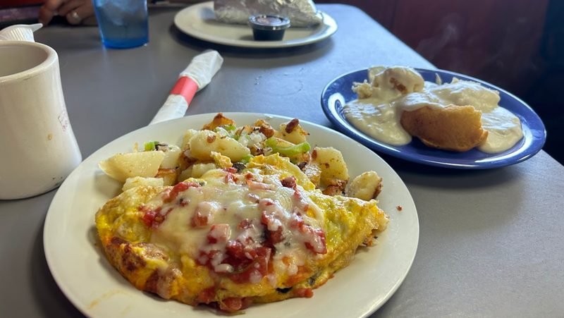 Loaded scramble with cottage potatoes and biscuits and gravy